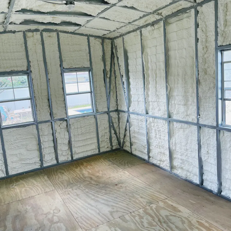 Closed-cell spray foam insulation applied to wall cavities in a residential project in Casper